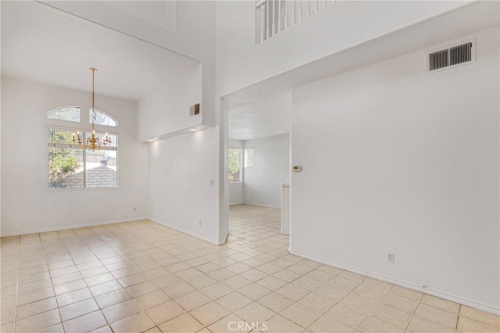 19321 Ackerman Avenue Newhall, CA 91321 - Photo 4 of 20 a view of an empty room and window