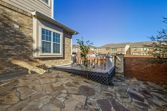 a view of deck with wooden floor and fence