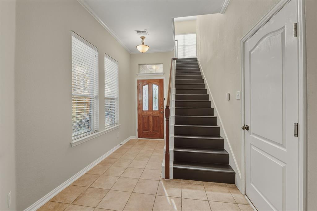 4027 Rome Court Irving, TX 75038 - Photo 4 of 33 a view of an entryway with stairs