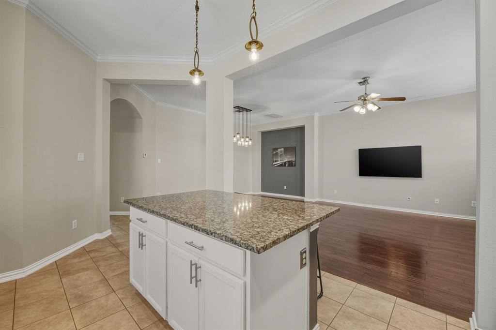 4027 Rome Court Irving, TX 75038 - Photo 33 of 33 a bathroom with a granite countertop sink a mirror and shower