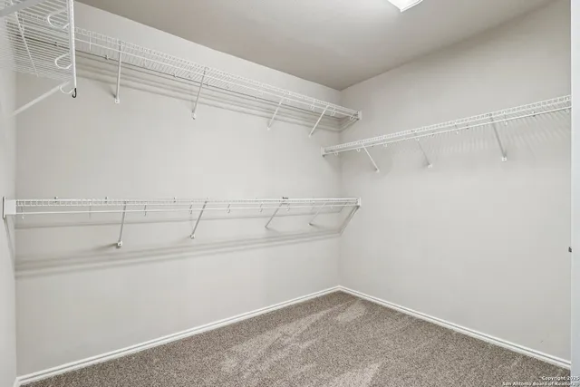 a view of a room with racks on the wall