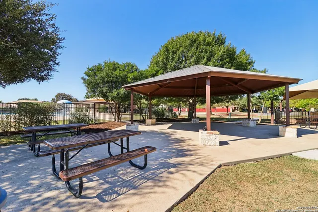 a view of a swimming pool with an outdoor space