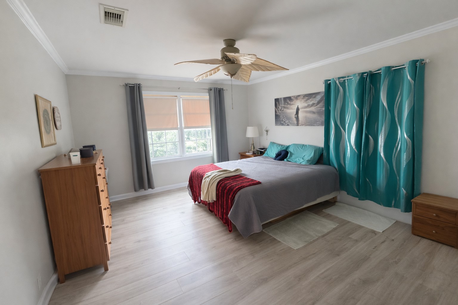 614 Sunset Lane La Marque, TX 77568 - Photo 10 of 12 a bedroom with a bed and a chair