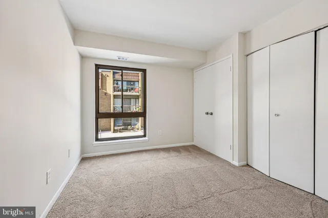 a bathroom with a shower and a toilet