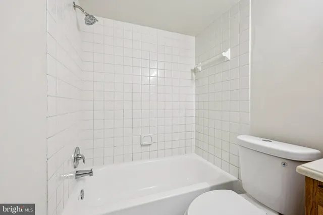 a view of a large building from a balcony