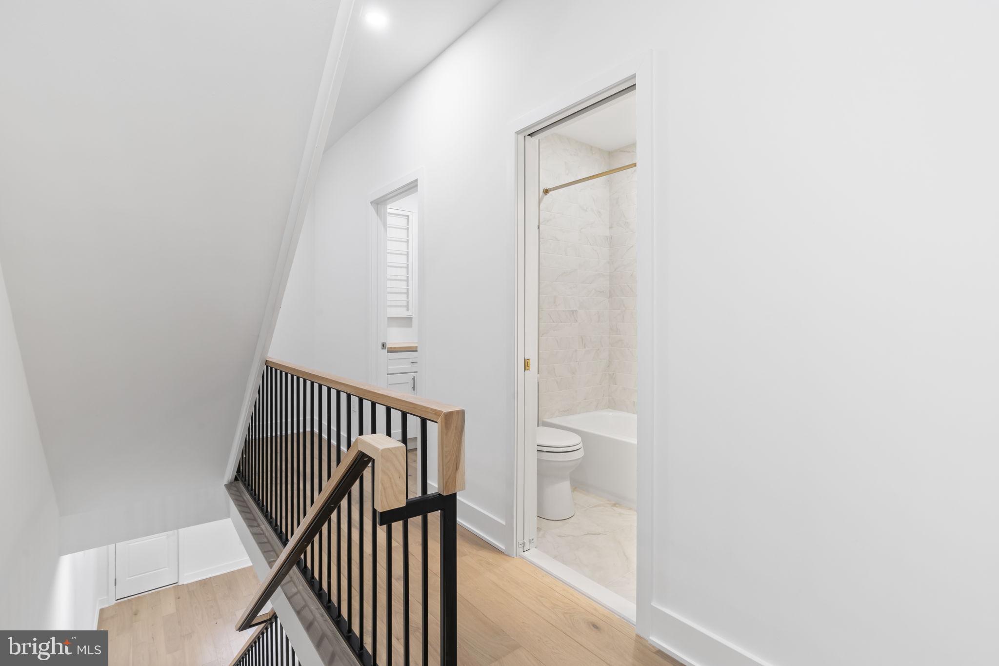 1318 South 8th Street Philadelphia, PA 19147 - Photo 16 of 47 a view of a hallway with a room