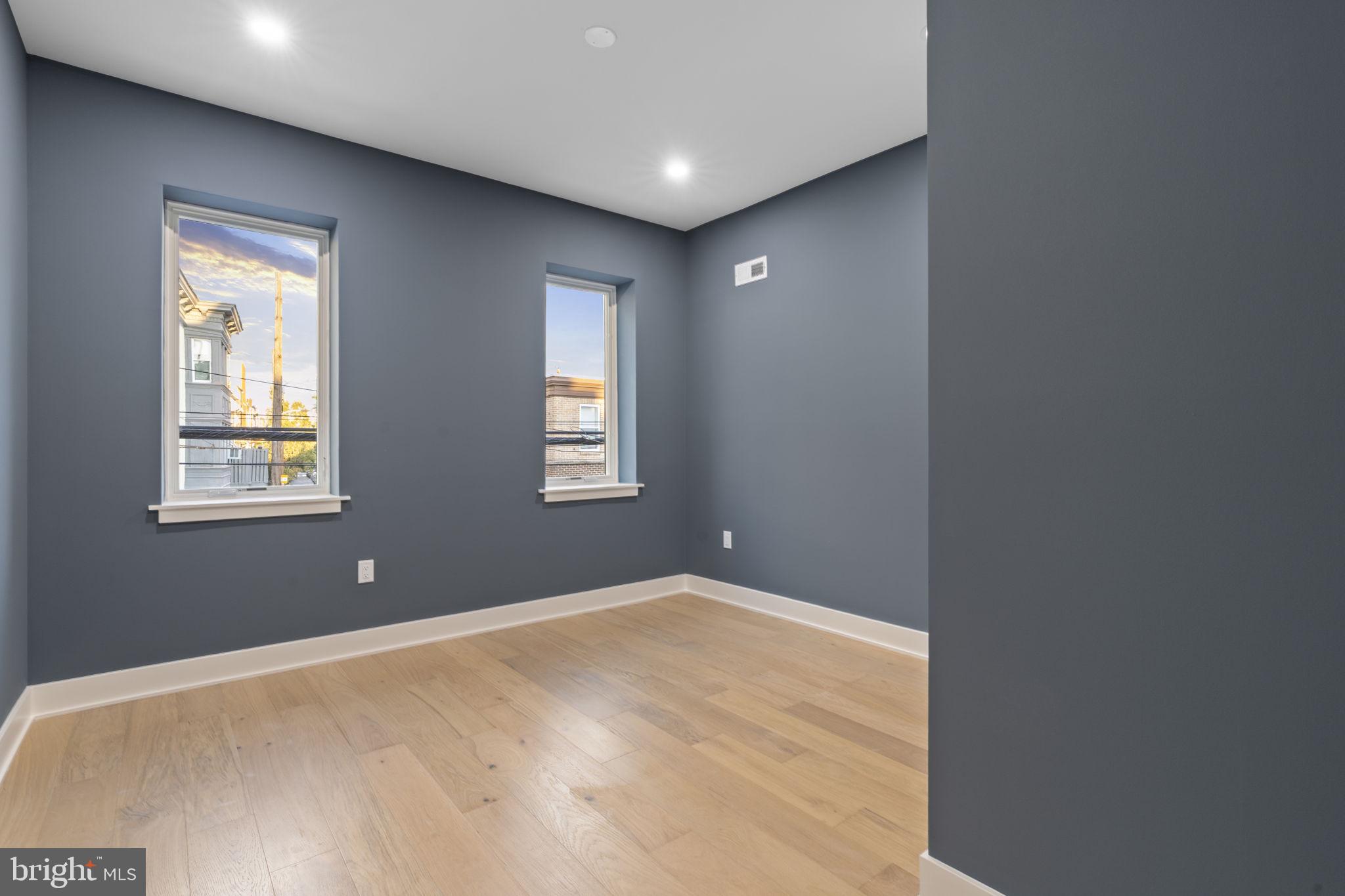 1318 South 8th Street Philadelphia, PA 19147 - Photo 19 of 47 a view of empty room with windows