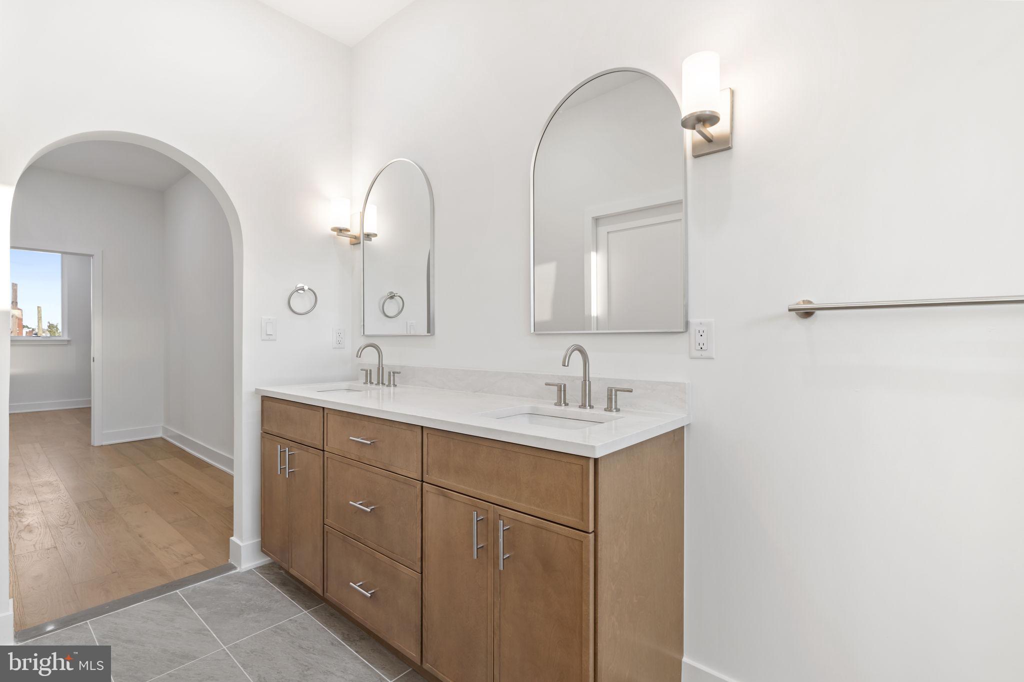 1318 South 8th Street Philadelphia, PA 19147 - Photo 28 of 47 a bathroom with 2 sink and a mirror