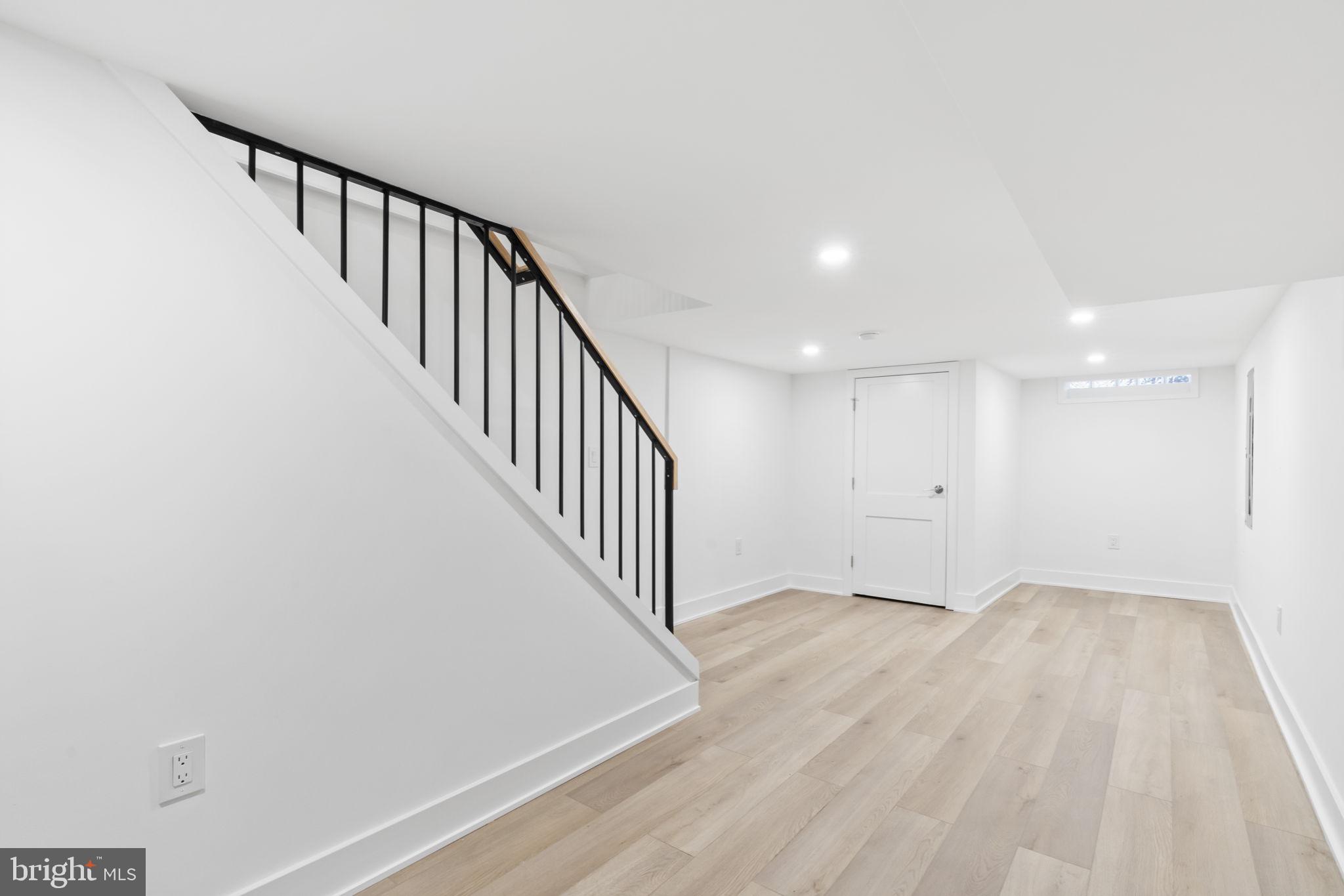 1318 South 8th Street Philadelphia, PA 19147 - Photo 41 of 47 a view of an entryway with wooden floor