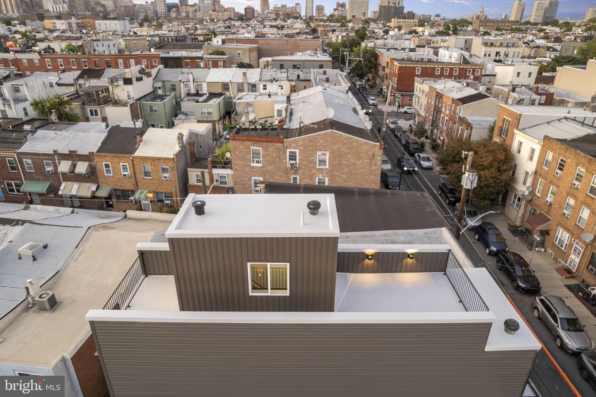 1318 South 8th Street Philadelphia, PA 19147 - Photo 43 of 47 an aerial view of residential houses with city view