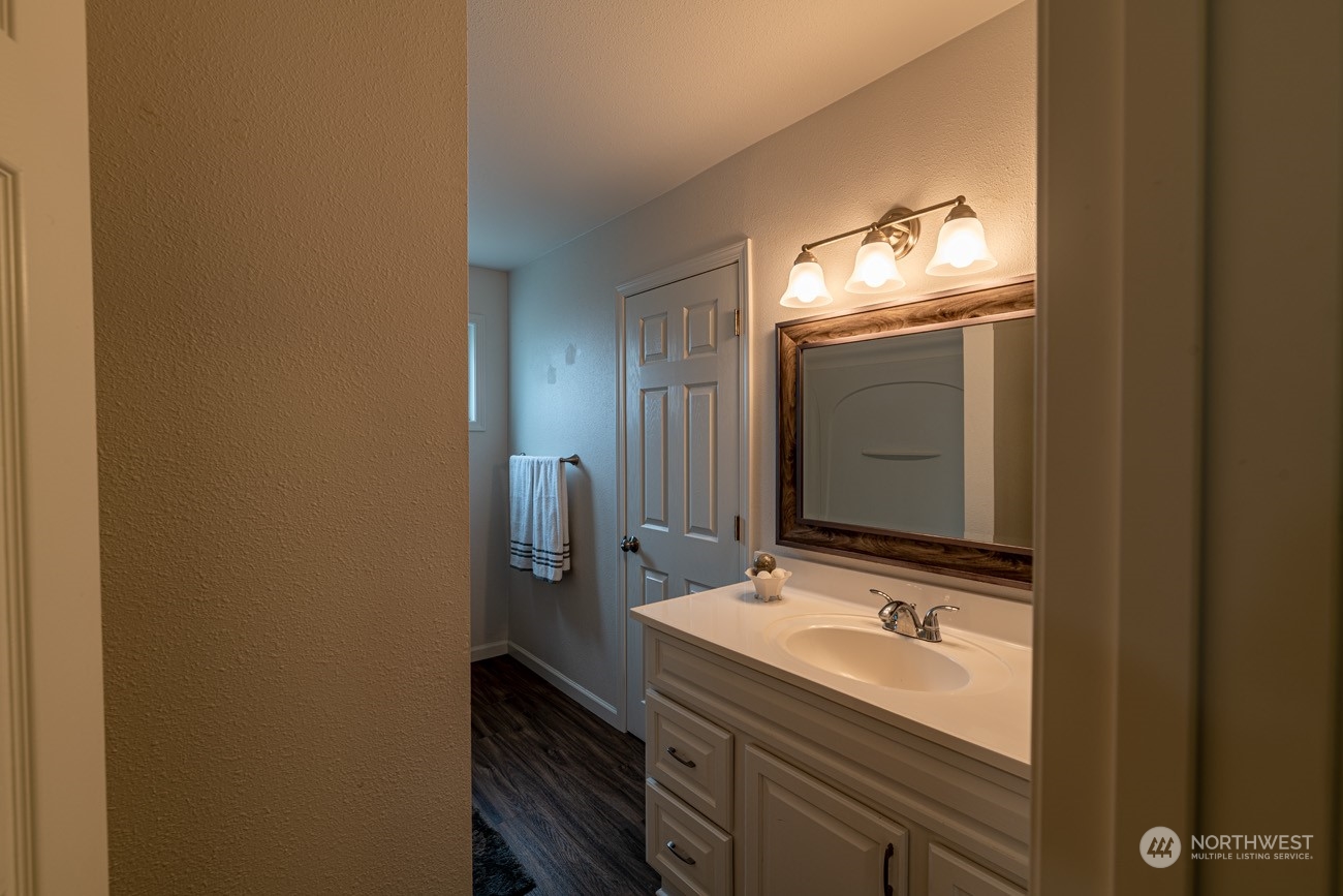 139 West Frostad Road Oak Harbor, WA 98277 - Photo 16 of 39 a bathroom with a sink and mirror