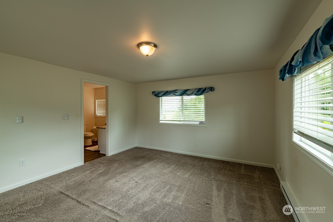 139 West Frostad Road Oak Harbor, WA 98277 - Photo 18 of 39 an empty room with windows