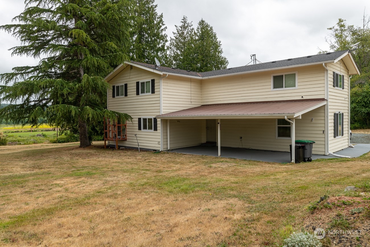139 West Frostad Road Oak Harbor, WA 98277 - Photo 30 of 39 front view of a house with a yard