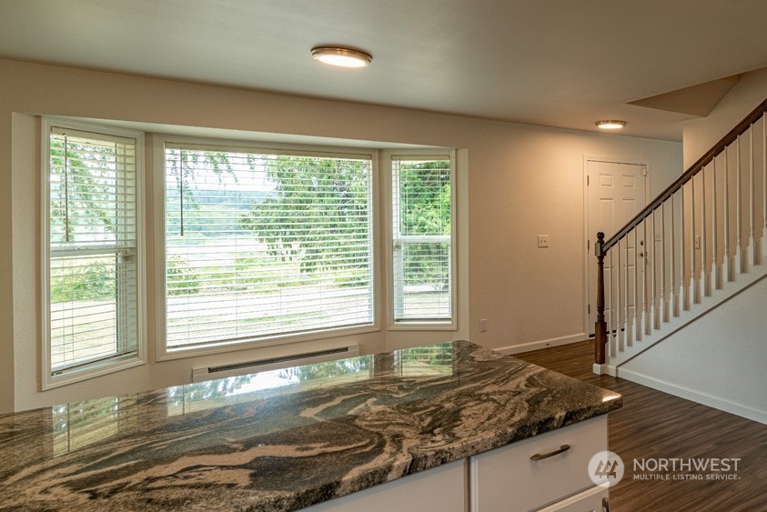 139 West Frostad Road Oak Harbor, WA 98277 - Photo 7 of 39 a view of a kitchen with a sink and large window