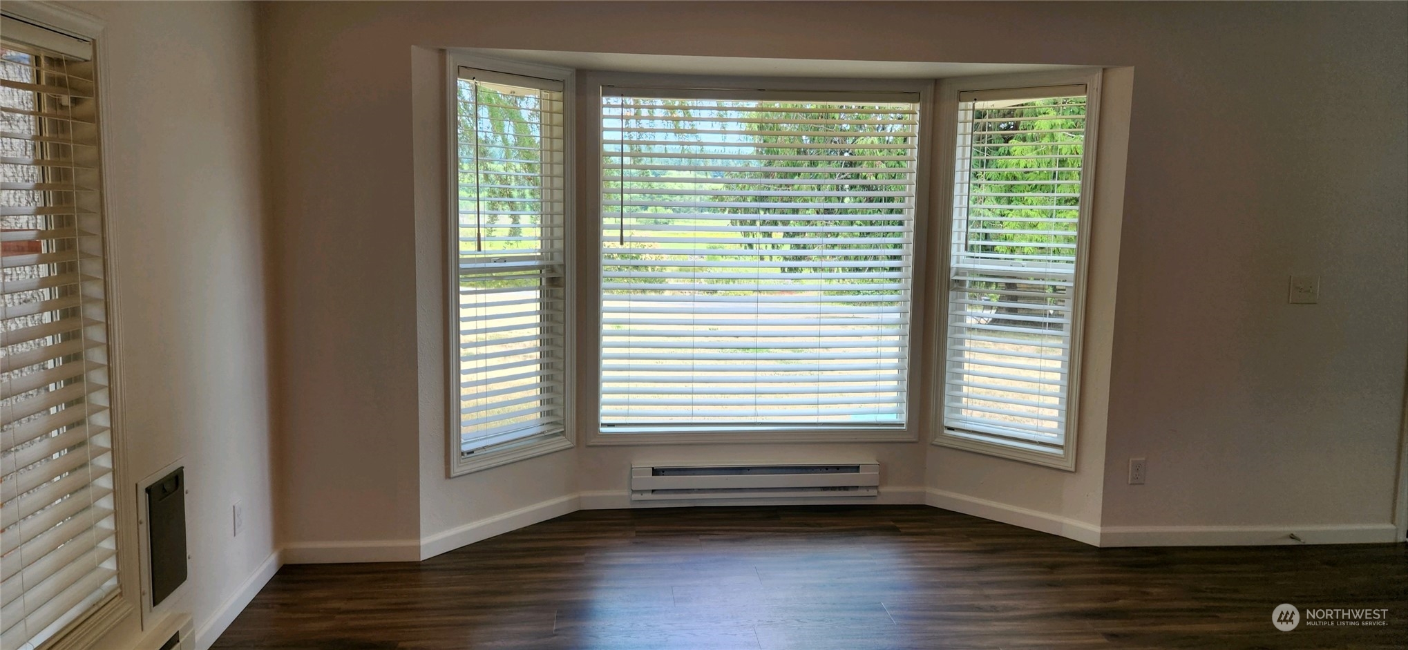 139 West Frostad Road Oak Harbor, WA 98277 - Photo 8 of 39 a view of a room with wooden floor and a window