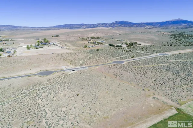 a view of an ocean beach and mountain