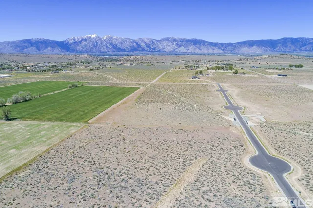 a view of a backyard with an ocean