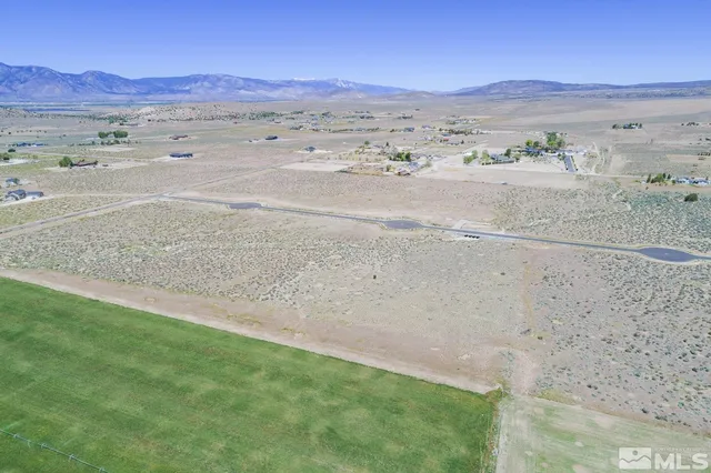 a view of an ocean beach and mountain view