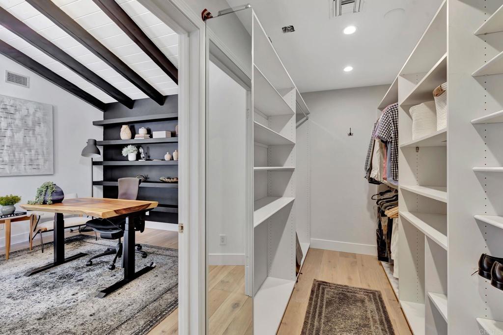 201 Sierra Ridge Drive Encinitas, CA 92024 - Photo 14 of 45 a view of a hallway with seating area