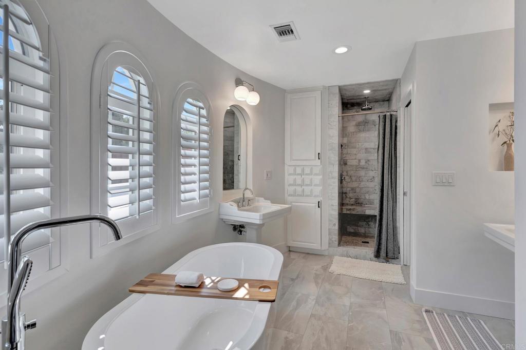 201 Sierra Ridge Drive Encinitas, CA 92024 - Photo 16 of 45 a living room with furniture and window