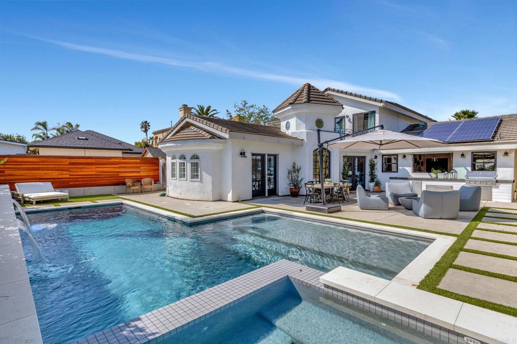201 Sierra Ridge Drive Encinitas, CA 92024 - Photo 30 of 45 a view of a house with swimming pool and sitting area