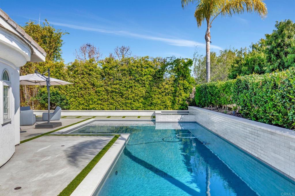 201 Sierra Ridge Drive Encinitas, CA 92024 - Photo 32 of 45 a view of a backyard and a house