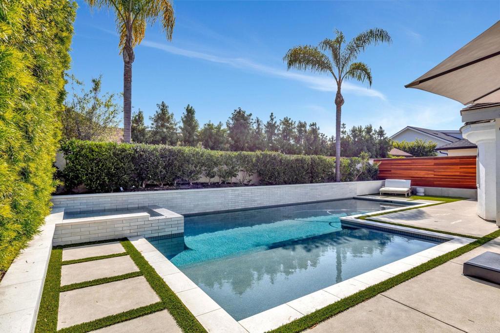 201 Sierra Ridge Drive Encinitas, CA 92024 - Photo 34 of 45 a view of a swimming pool with a patio