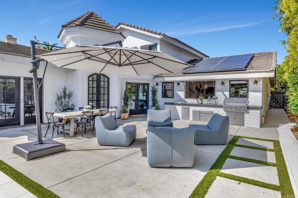 201 Sierra Ridge Drive Encinitas, CA 92024 - Photo 35 of 45 a view of the patio with couches table and chairs