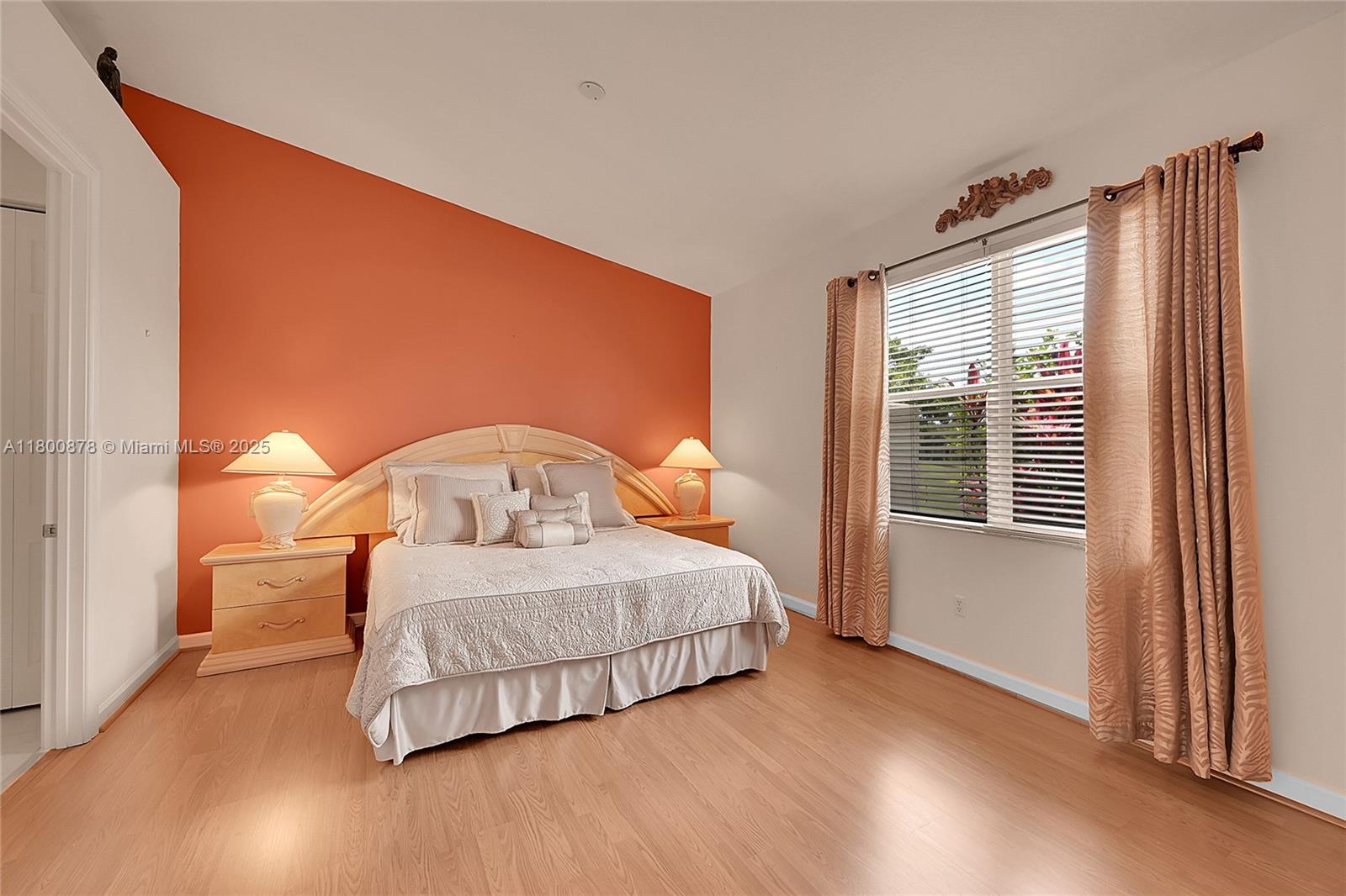 23157 Addison Lakes Circle Boca Raton, FL 33433 - Photo 12 of 30 a bedroom with a bed and window