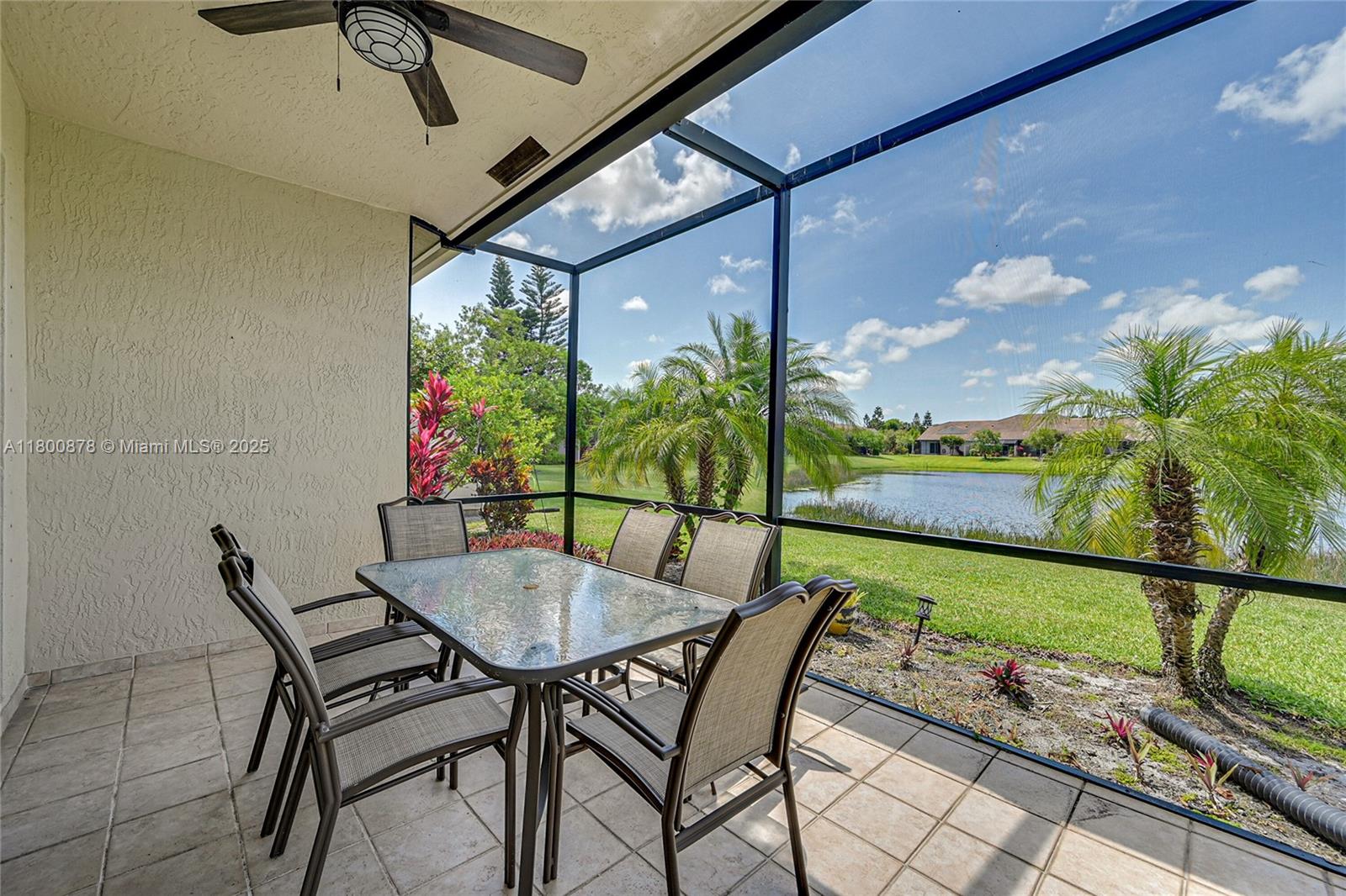 23157 Addison Lakes Circle Boca Raton, FL 33433 - Photo 23 of 30 a view of an chairs and table in the patio