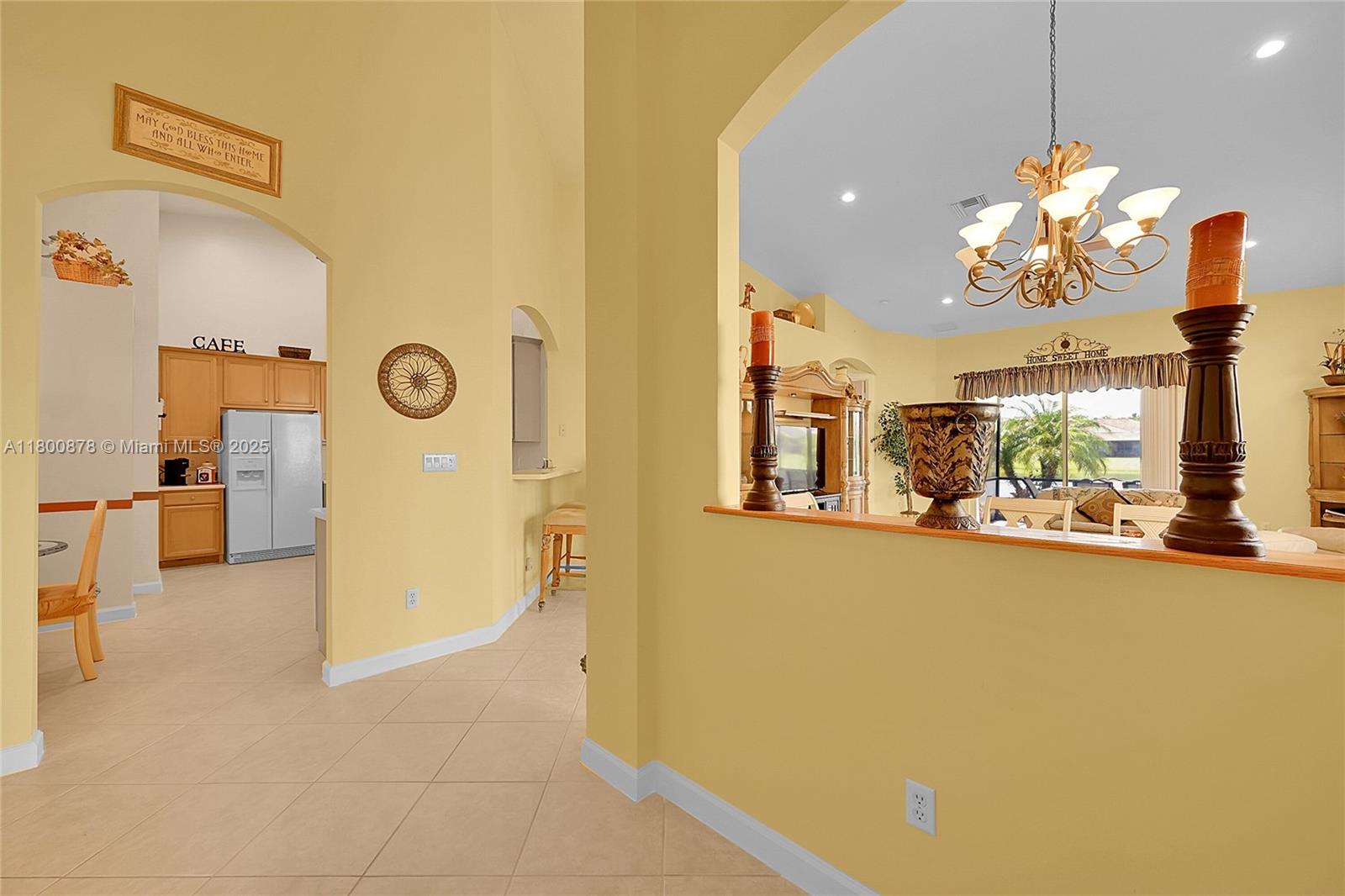 23157 Addison Lakes Circle Boca Raton, FL 33433 - Photo 6 of 30 a view of a room with a dining table and chairs