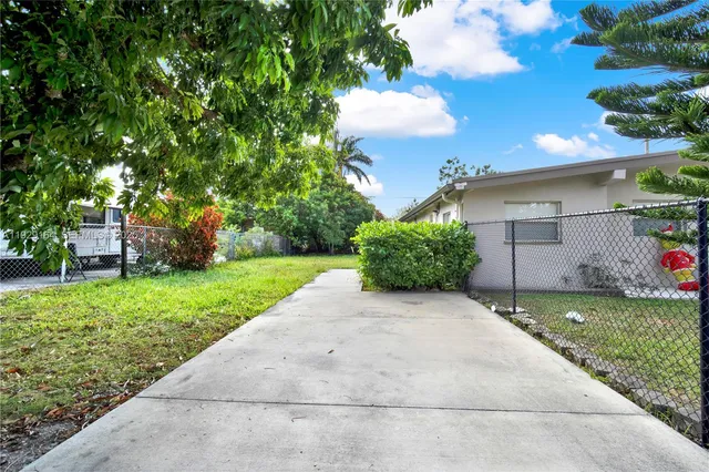 a view of a garden with a bench