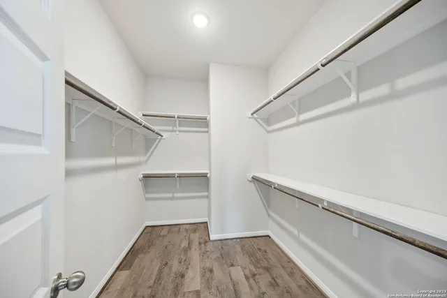 a view of an empty walk in closet