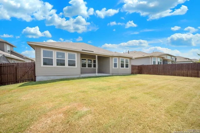 a view of a house with a swimming pool