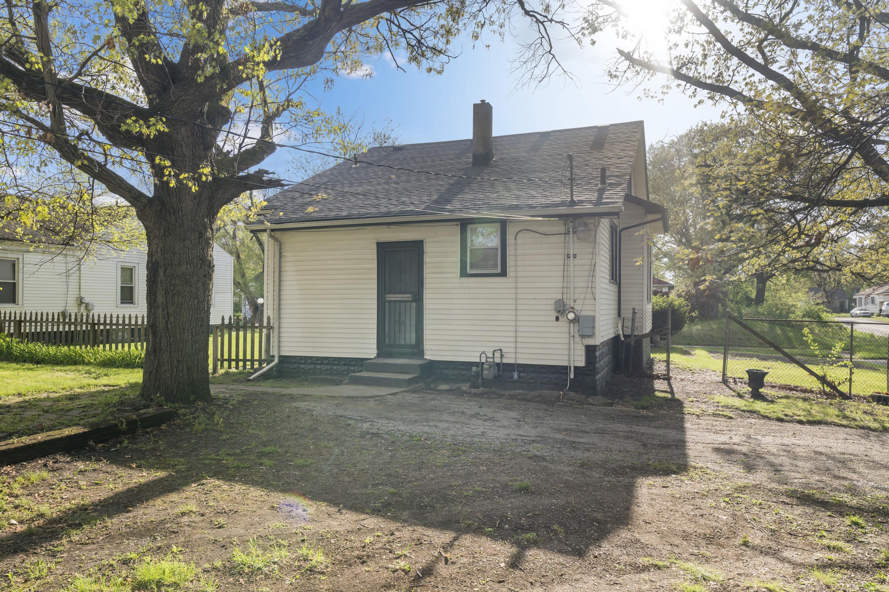 605 Mount Street Gary, IN 46406 - Photo 22 of 23 a view of a house with a yard