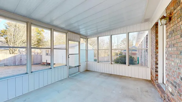 a view of a house with a yard and garage