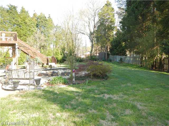 4103 Chilton Way High Point, NC 27265 - Photo 3 of 14 Exterior Back. Large backyard for all kinds of activities.