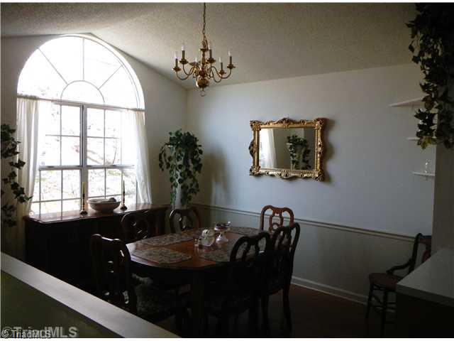 4103 Chilton Way High Point, NC 27265 - Photo 5 of 14 Dining Room. Beautiful dining room with a great view of the cherry tree.