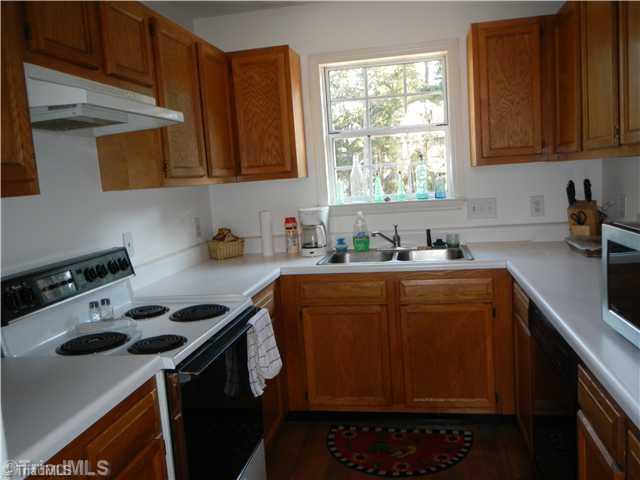 4103 Chilton Way High Point, NC 27265 - Photo 6 of 14 Kitchen. Enjoy preparing many meals with lots of counter space and cabinets all around.