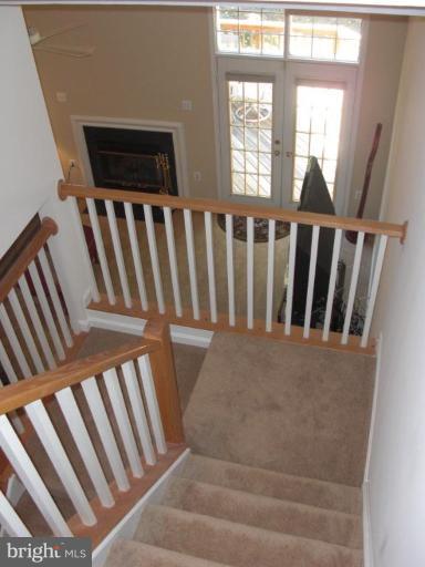 1234 Weatherstone Court Reston, VA 20194 - Photo 9 of 18 a view of stairs and rug