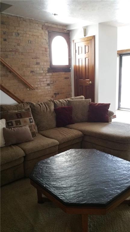 23 Main Street Freeport, PA 16229 - Photo 8 of 17 Livingroom with sectional & coffee table convey!