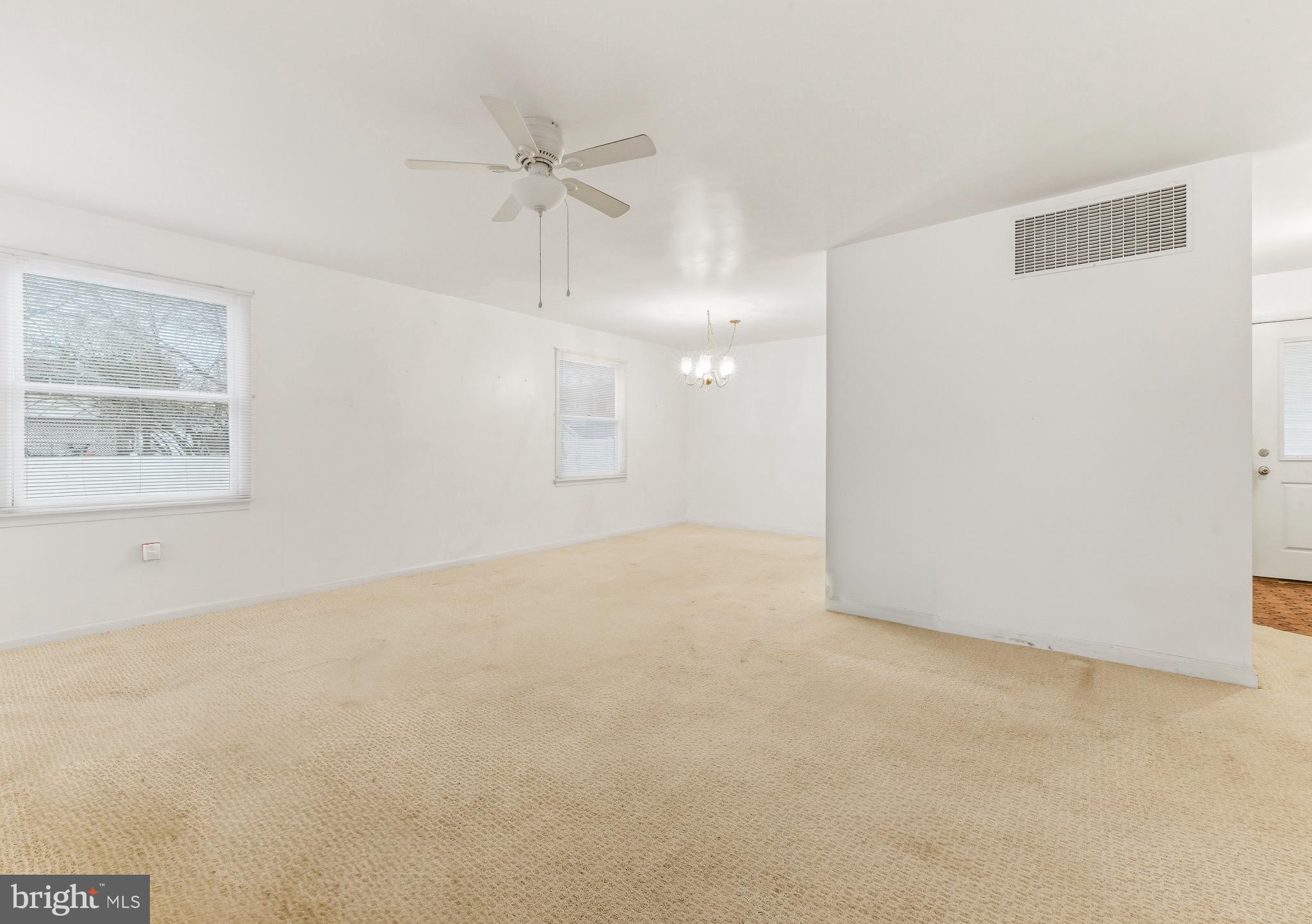 412 Alcyon Boulevard Pitman, NJ 08071 - Photo 11 of 22 an empty room with fan and windows