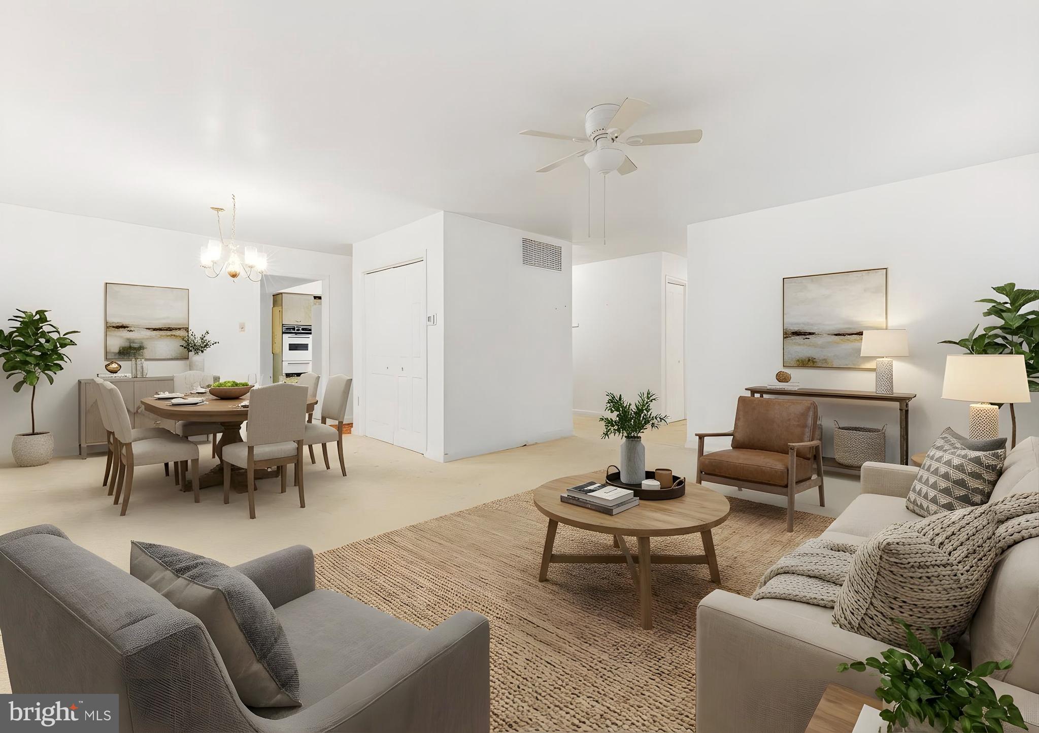 412 Alcyon Boulevard Pitman, NJ 08071 - Photo 13 of 22 a living room with furniture potted plant and white walls
