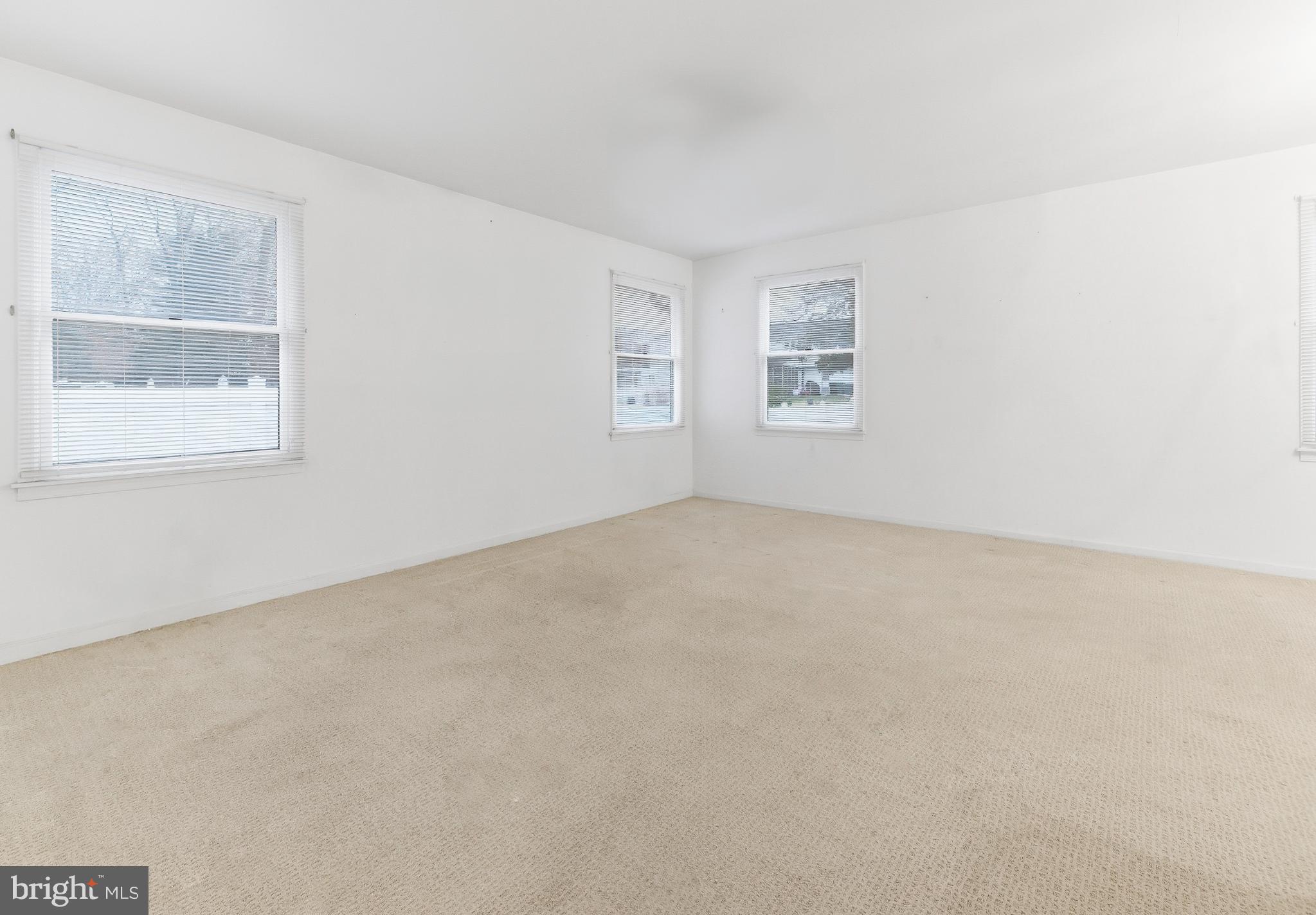 412 Alcyon Boulevard Pitman, NJ 08071 - Photo 14 of 22 an empty room with windows