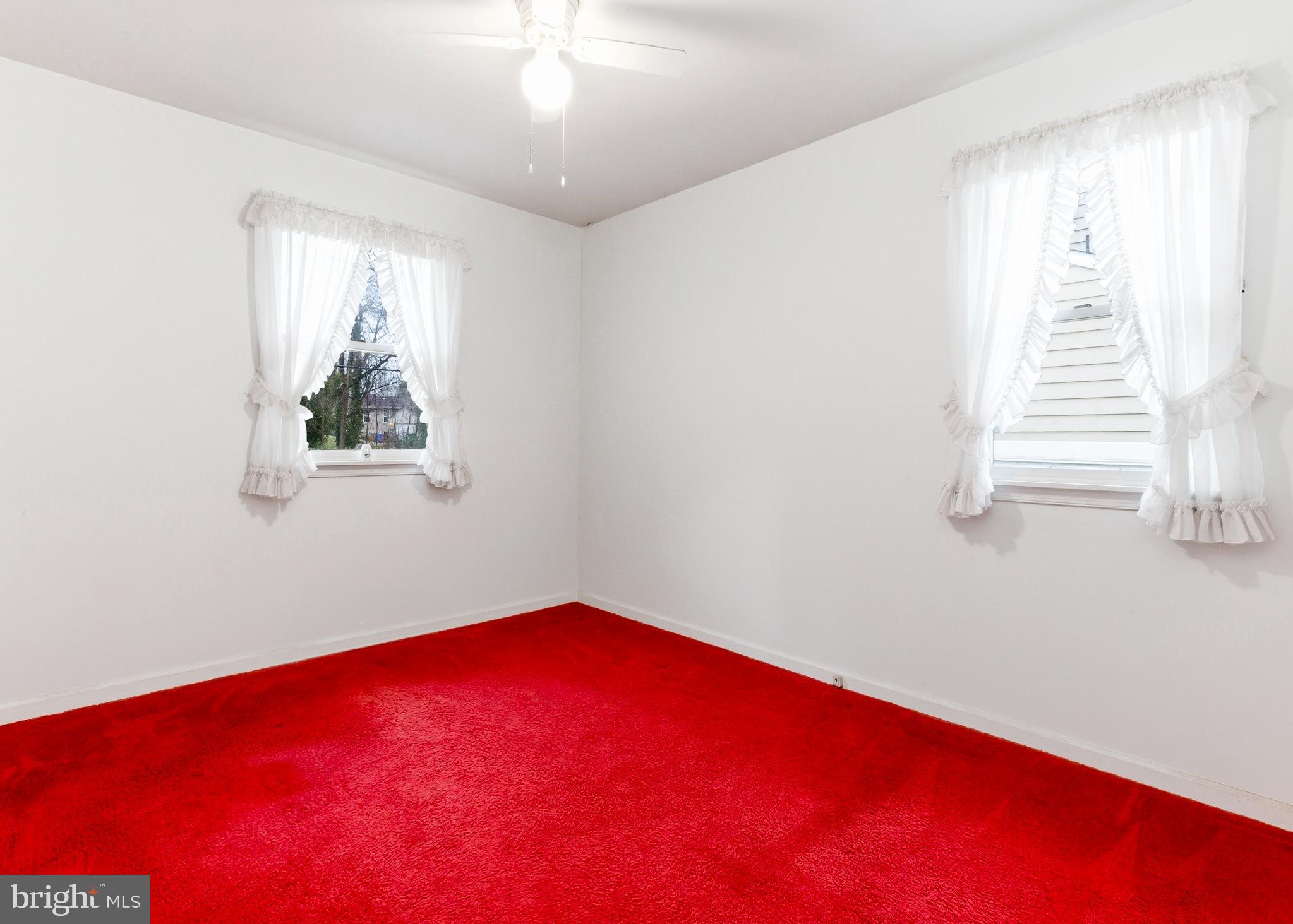 412 Alcyon Boulevard Pitman, NJ 08071 - Photo 17 of 22 an empty room with windows and closet