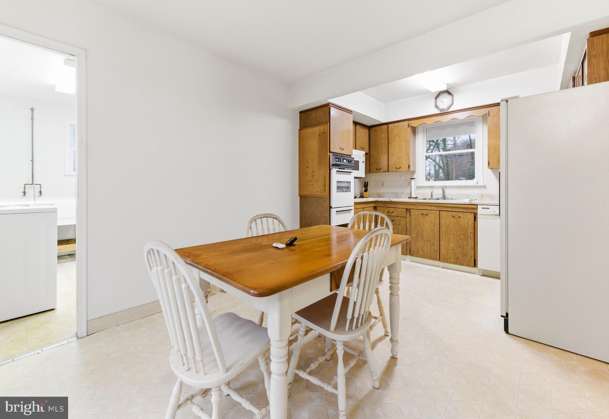 412 Alcyon Boulevard Pitman, NJ 08071 - Photo 6 of 22 a view of a dining room with furniture and wooden floor
