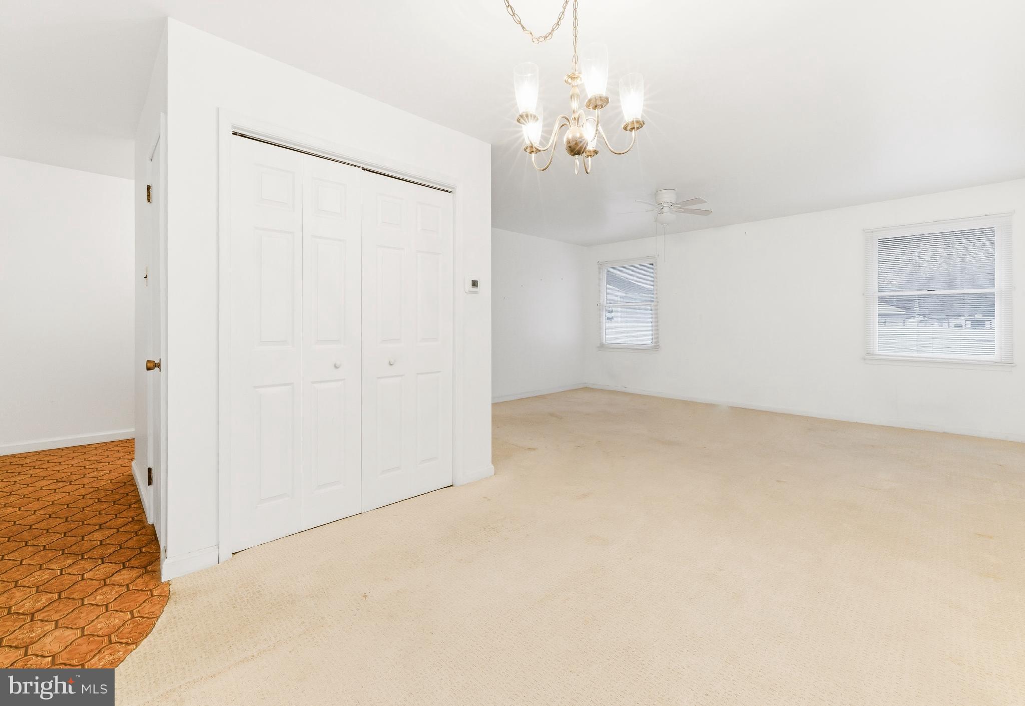 412 Alcyon Boulevard Pitman, NJ 08071 - Photo 10 of 22 en empty room with wooden floor