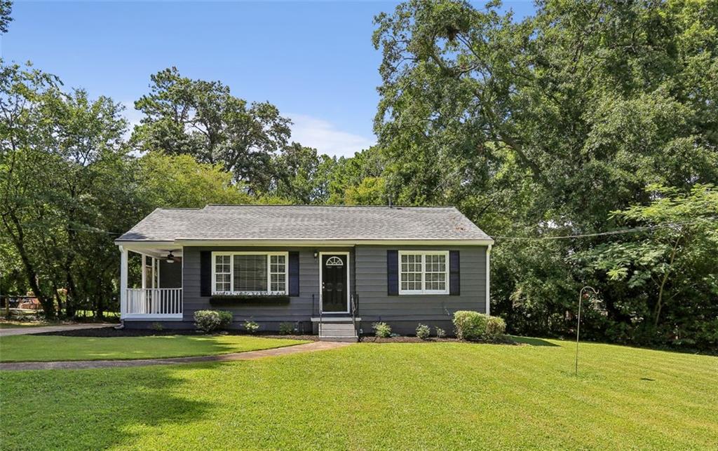 4018 Eula Circle Doraville, GA 30360 - Photo 1 of 1 a front view of a house with a garden