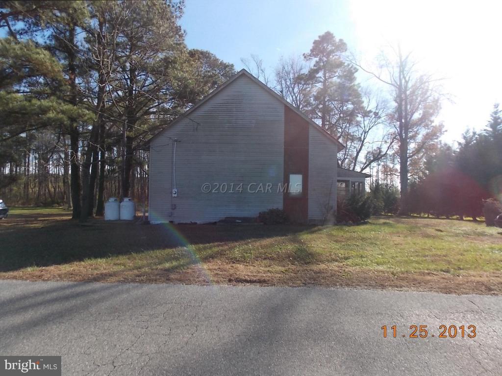 27223 Mt Vernon Road Princess Anne, MD 21853 - Photo 1 of 11 a house with trees in the background
