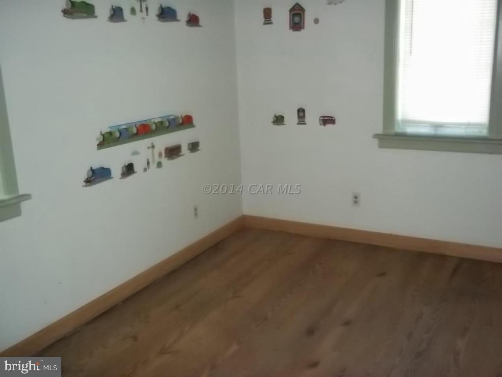 27223 Mt Vernon Road Princess Anne, MD 21853 - Photo 7 of 11 an empty room with a window
